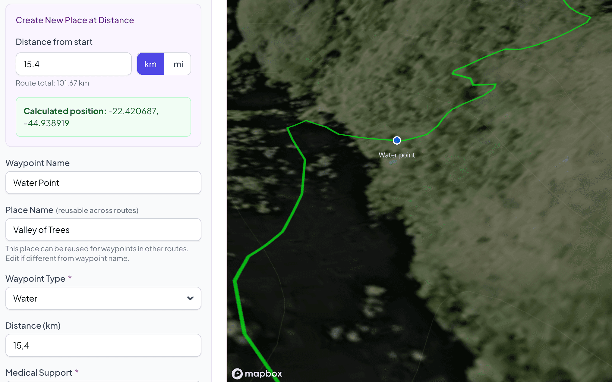 Terranaut admin — placing an aid station waypoint at an exact distance along the route
